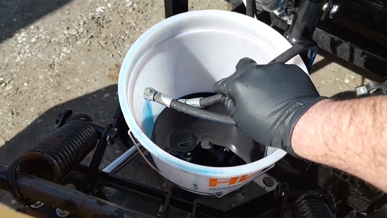 How to change the hydraulic fluid in your fisher plow. specifically, fisher homesteader!!