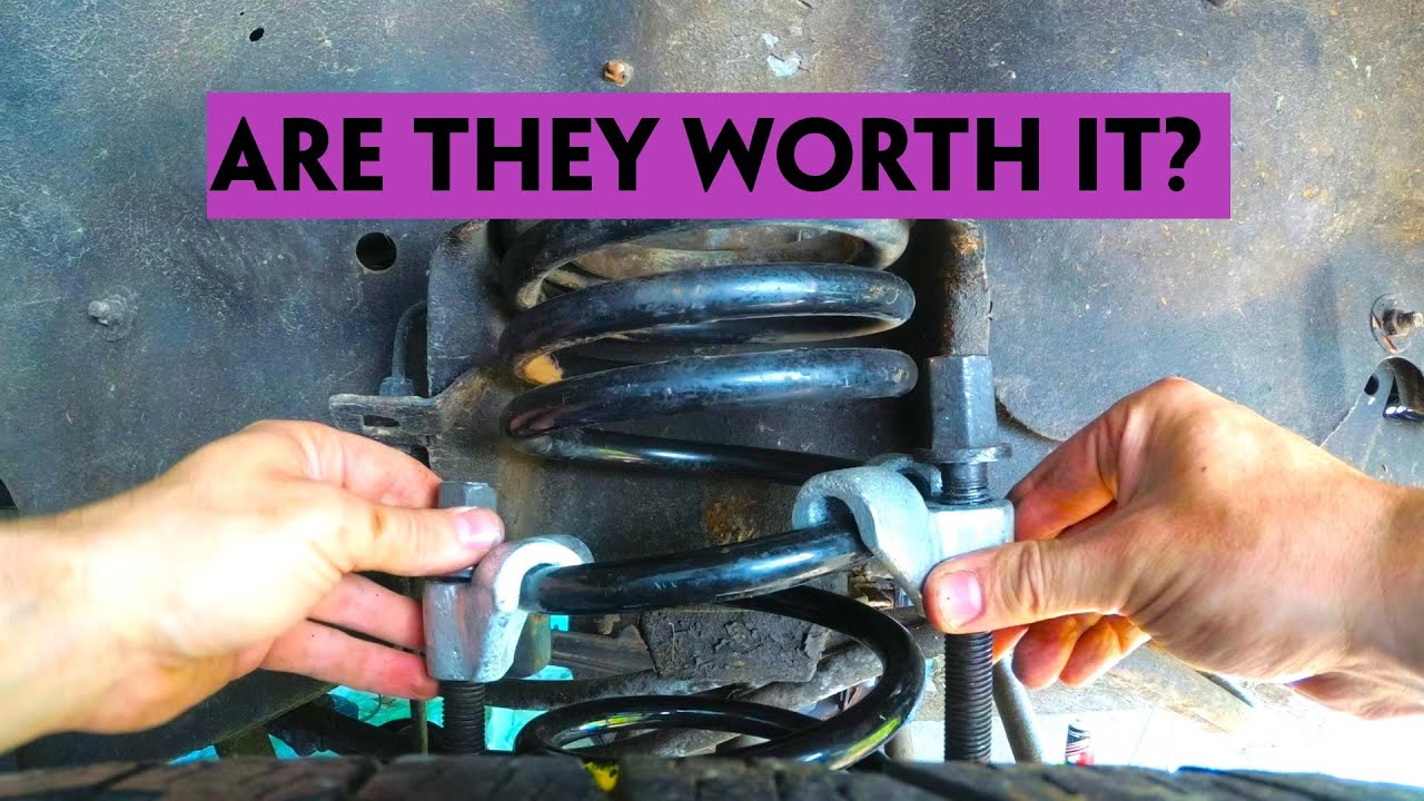 Experimenting with Spring Compressors on Defender Front Springs. Removing the Lift