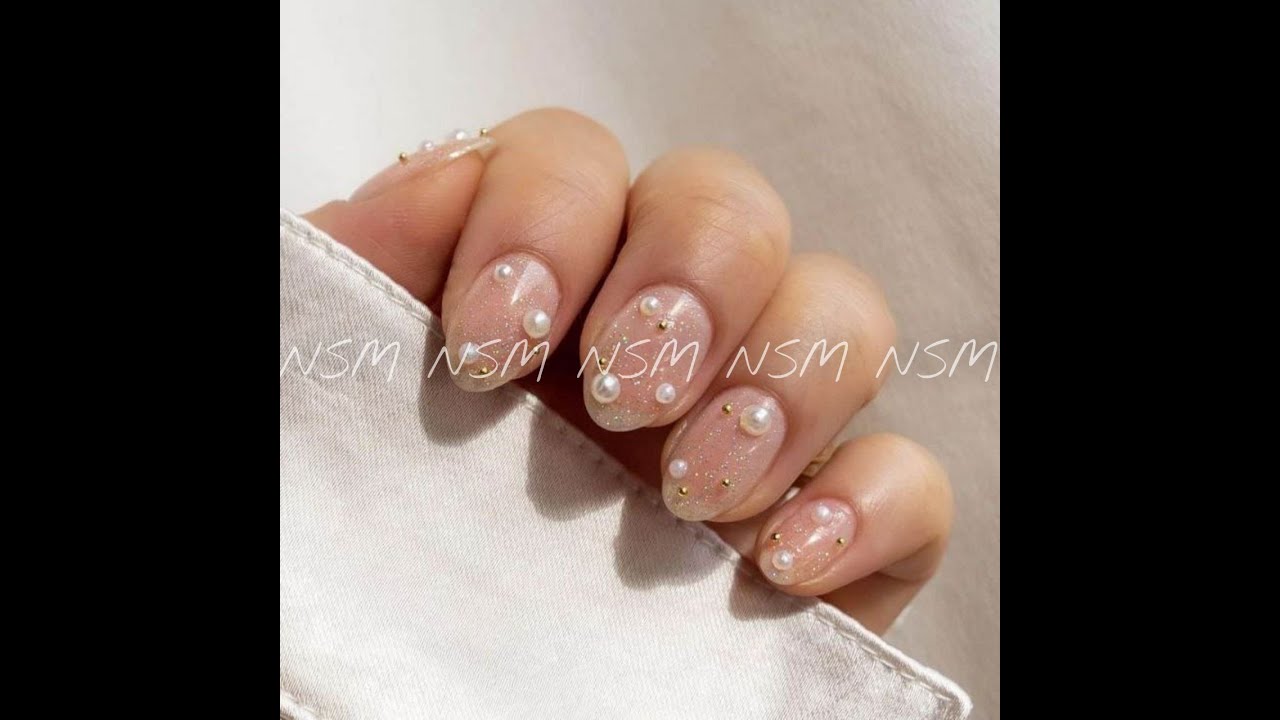 Pearls and Crystal Diamond Nail Decor #pearl #pearlnails #nailartproduct #nailart #nailproduct