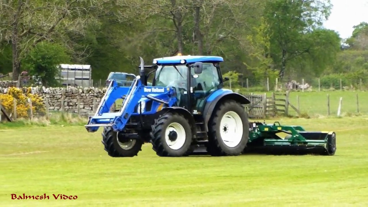 Gang-Mowing the Sports Field with New Holland.  What Sort?