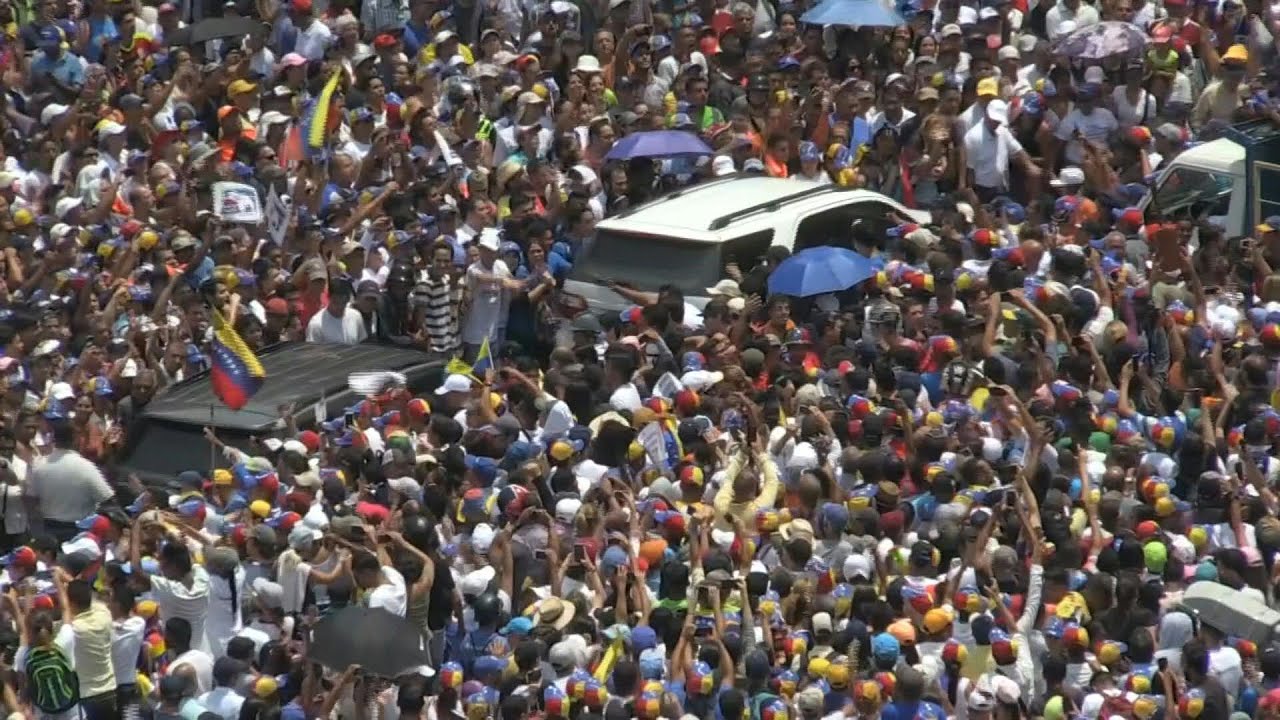 Guaido's convoy arrives at May Day demonstration