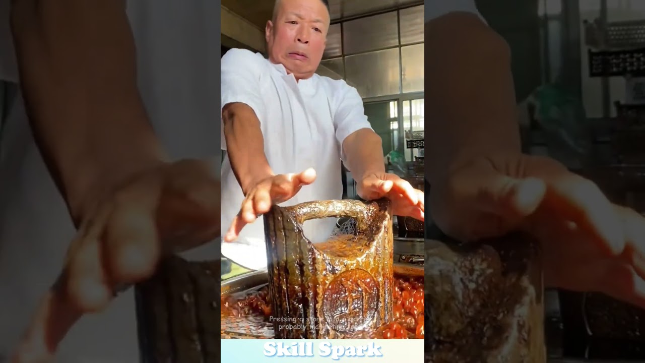 Pressing a stone into a barrel&mdash;probably marinating food! #food