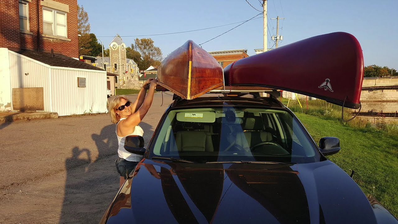 DIY extension for carrying more than one canoe on a standard roof rack.