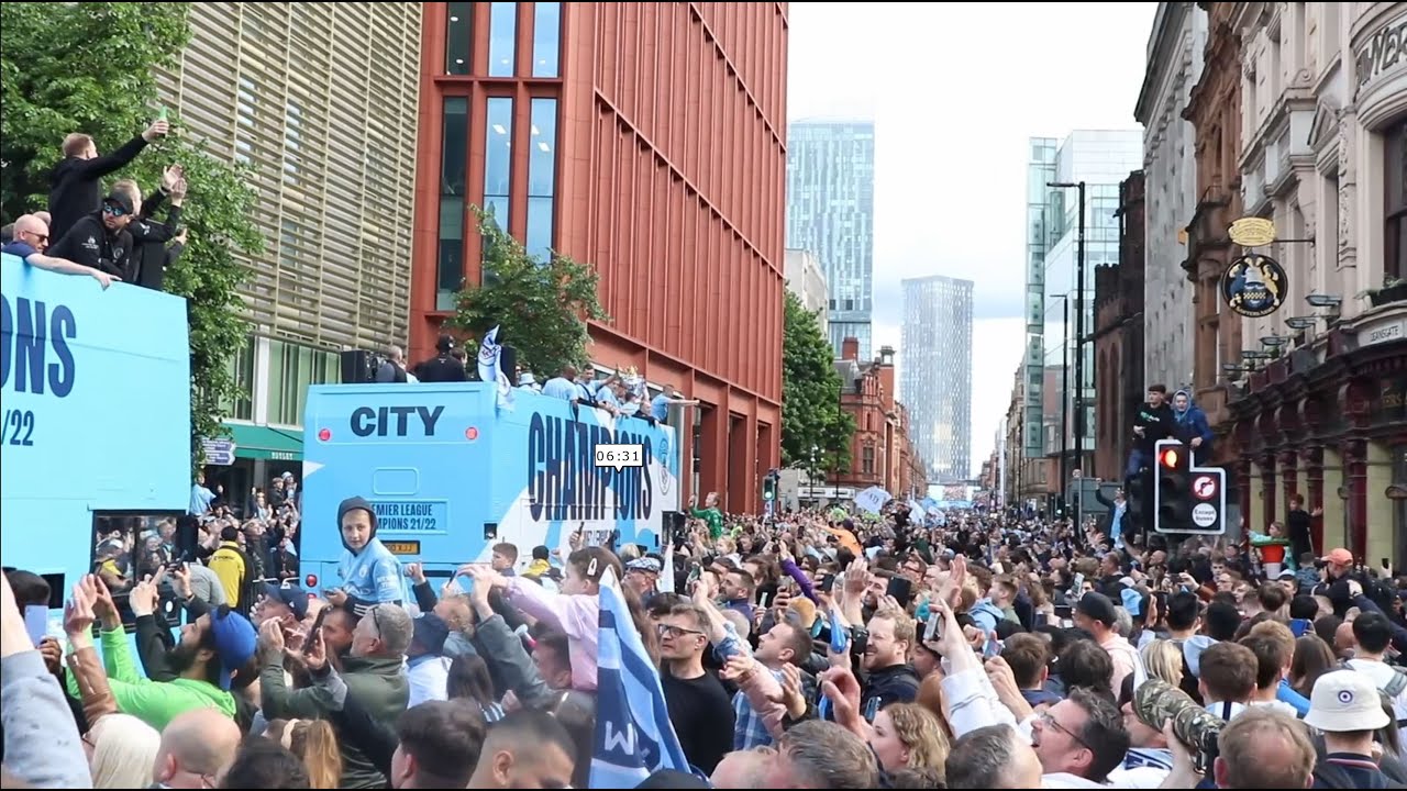 Manchester Turns Blue As Premier League Champions Parade Around City Centre