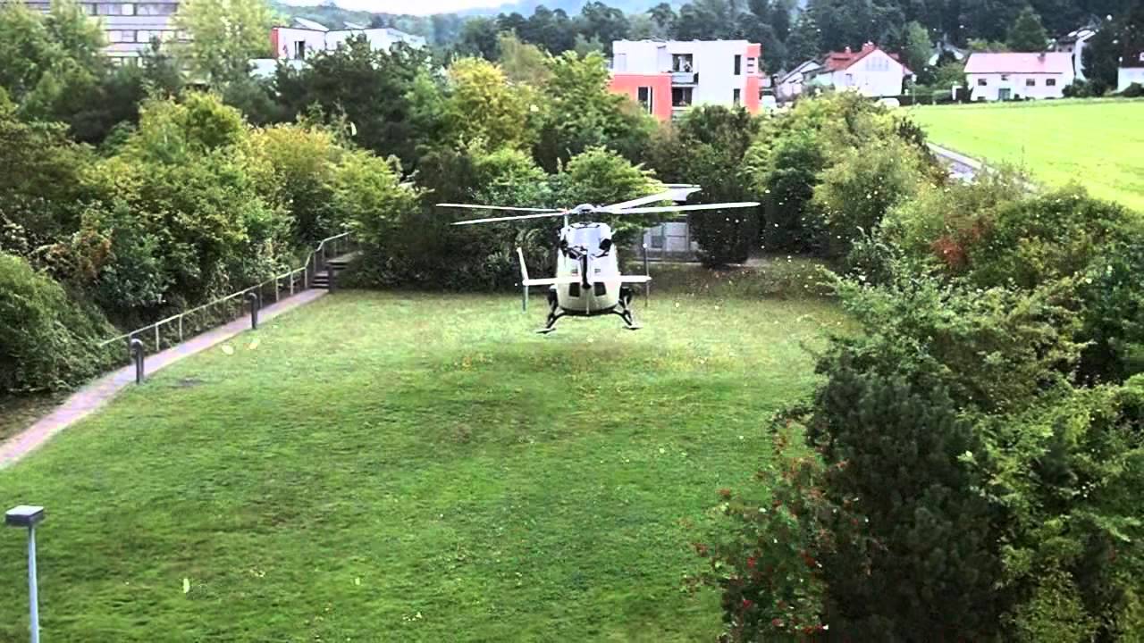 Police helicopter landing in front of our house
