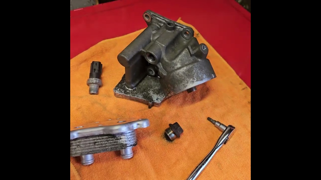 2006 Mini Cooper S R53 death rattle and oil leak and oil filter housing plunger
