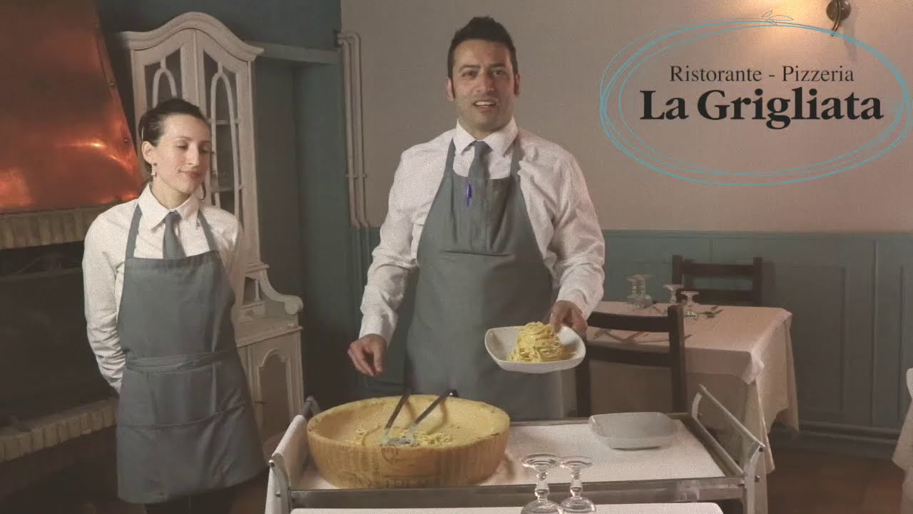Bucatini Flambè - La pasta mantecata nel Parmigiano Reggiano