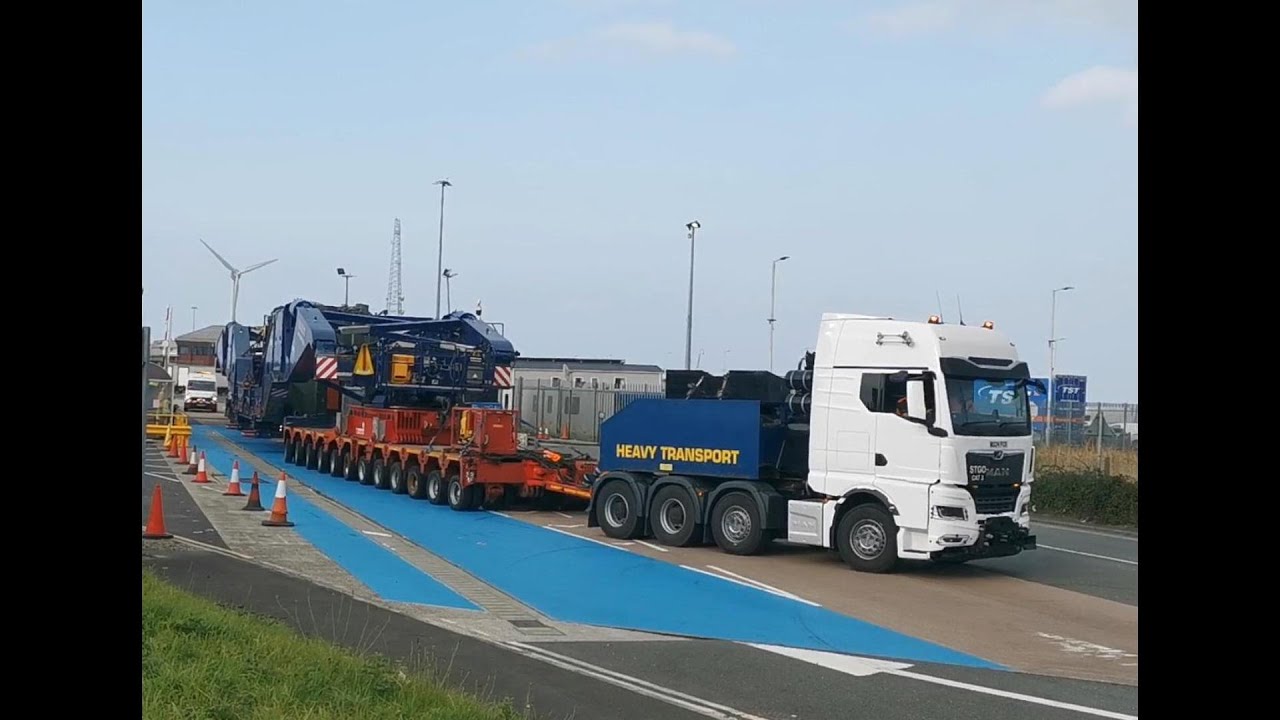 Huge Heavy Transformer on a long low loader