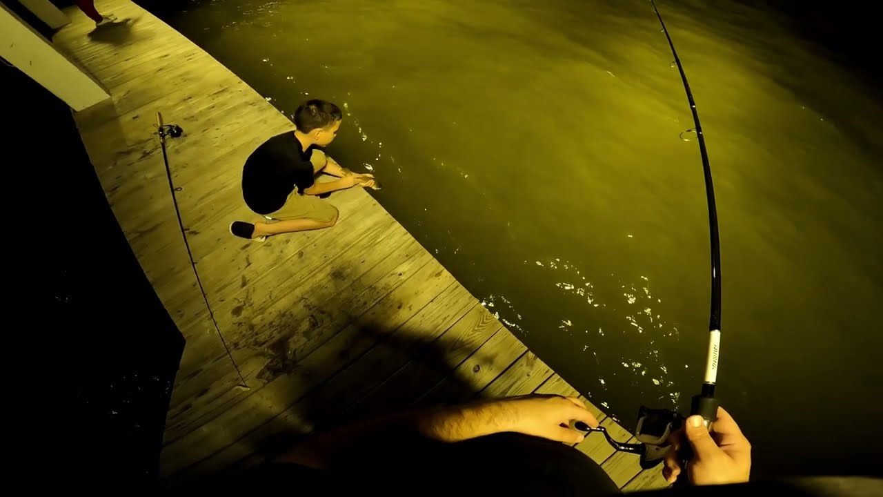 (SPECKLED TROUT) night fishing at the beach house!