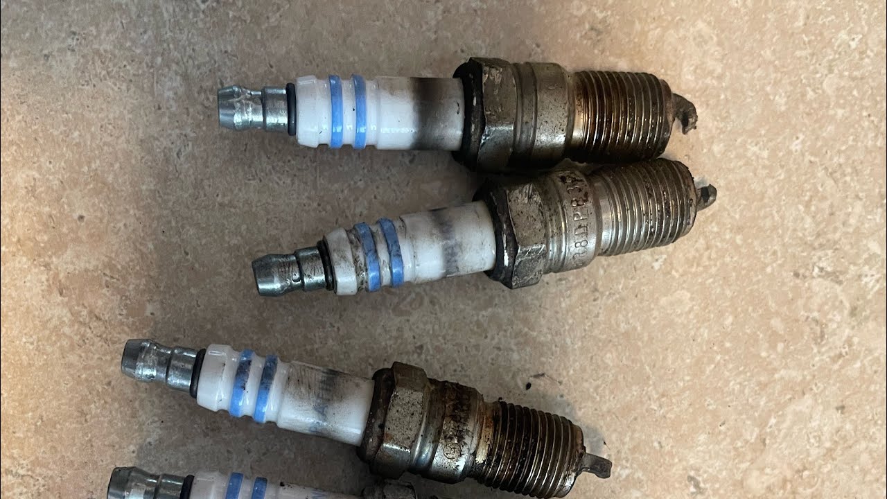 CHANGING A 04 MUSTANG SPARK PLUGS 