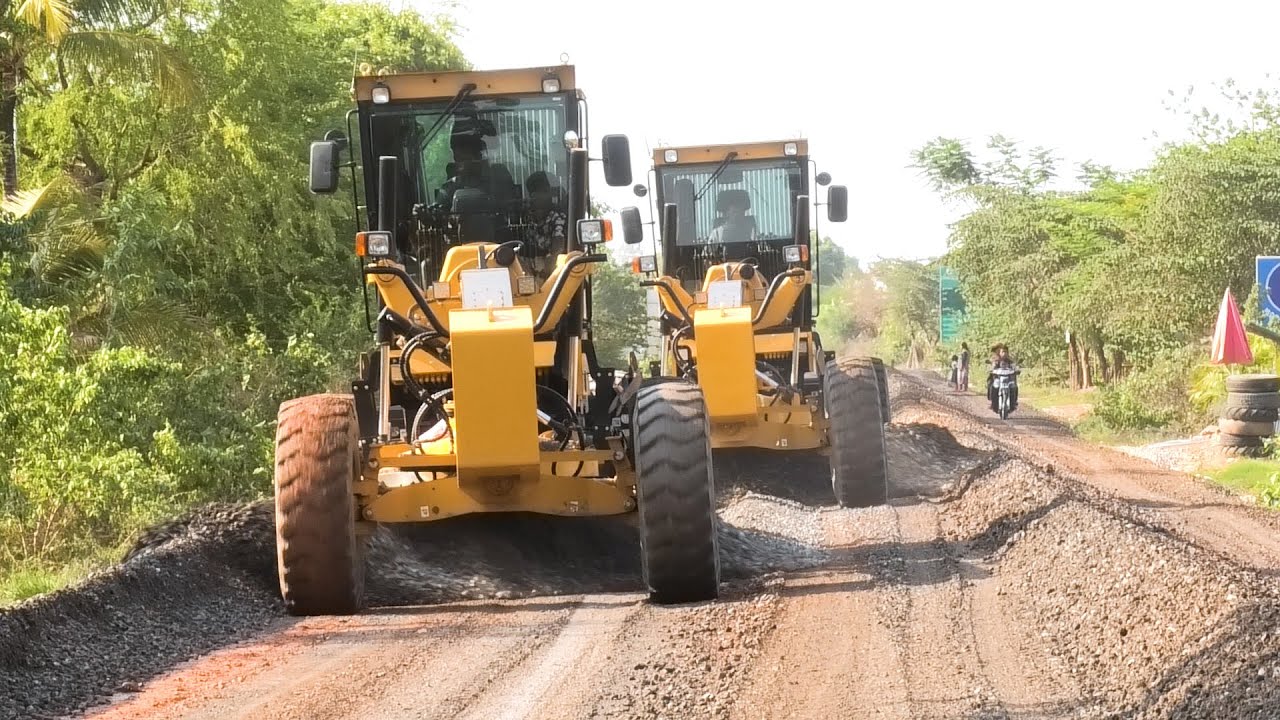 Exceptionally Pushing Gravel With A Heavy SANY C8S Motor Grader To Create A New Road Foundation