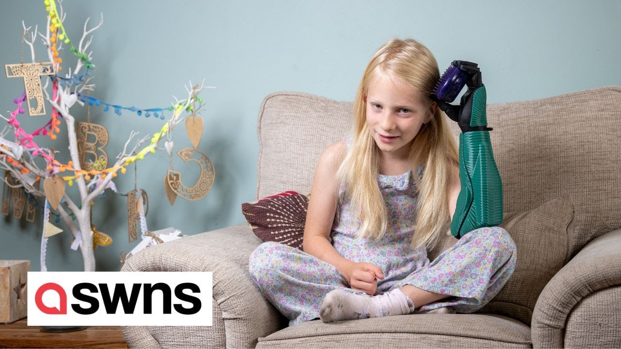 Girl, seven, youngest in UK to be fitted with bionic 'hero' arm | SWNS
