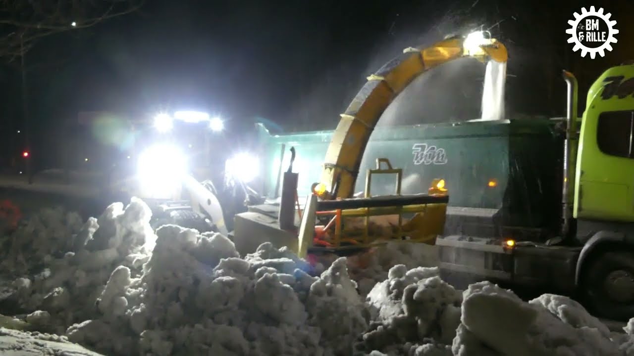 Volvo L70G with Snowblower Loading snow on trucks by night winter 2024