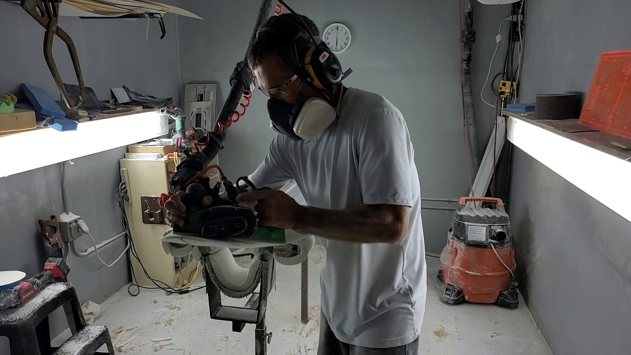 Foiling a deck with a modified planer.