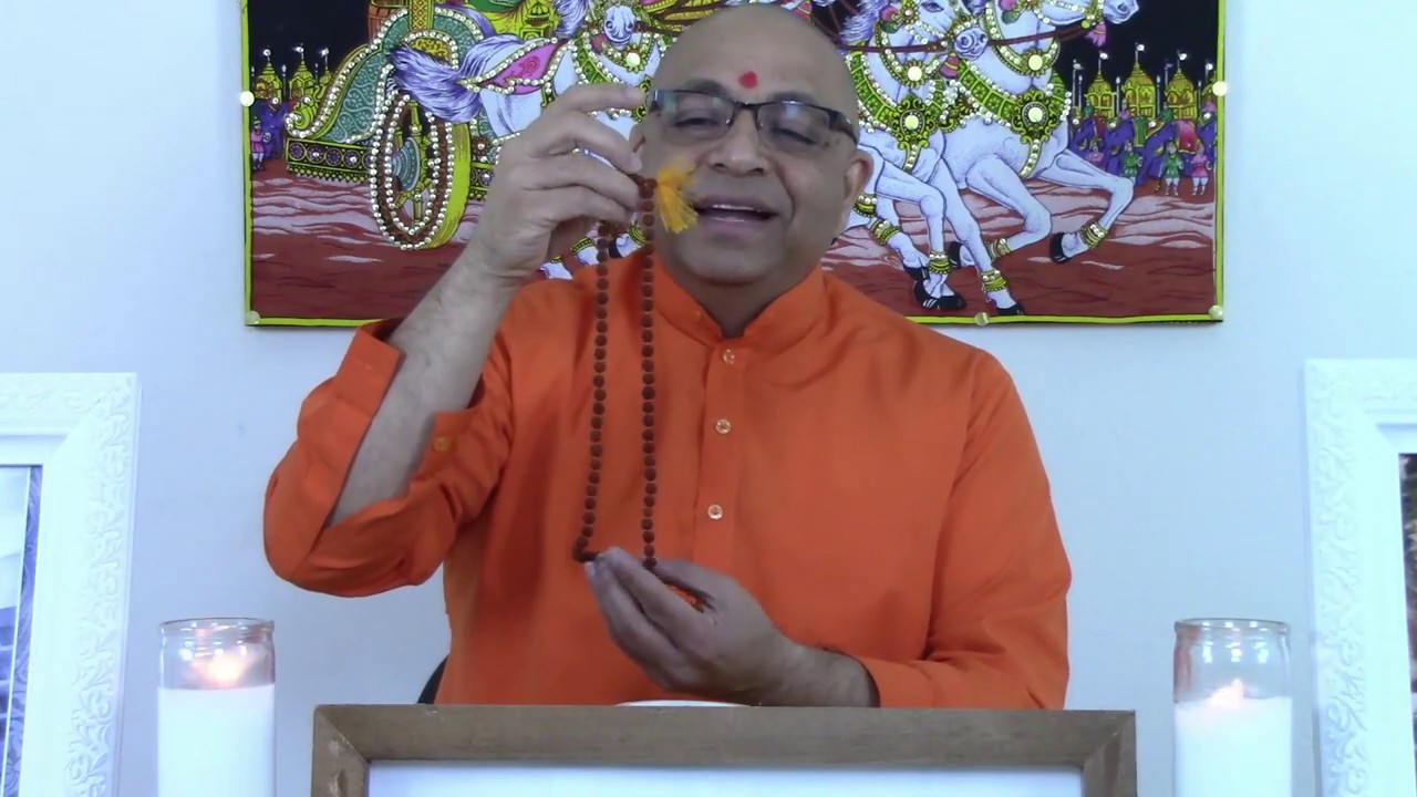 What is a Japa mala and how does one chant mantra with it?