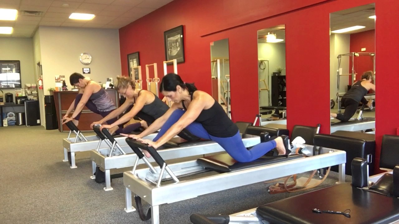 Front splits - Pilates Reformer