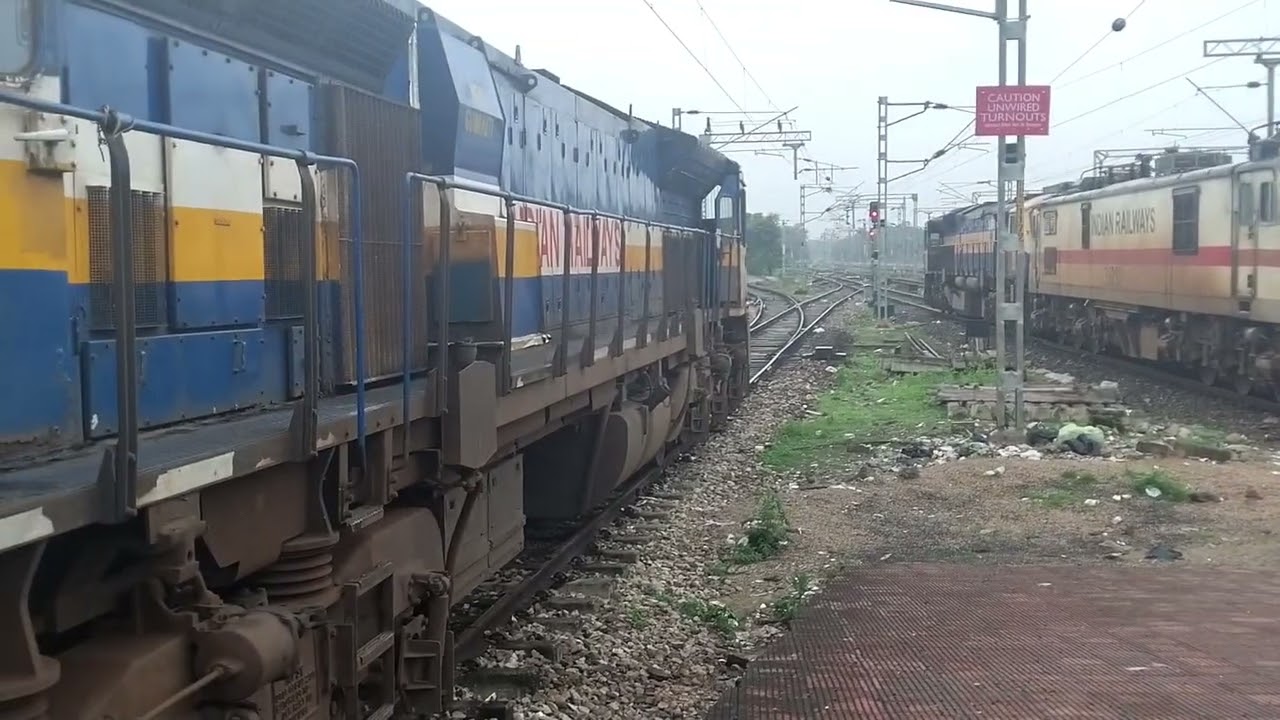 Dibrugarh Rajdhani Express coupling with WAP-7 pull by WDP- 4D for maintenance depot at Dibrugarh.