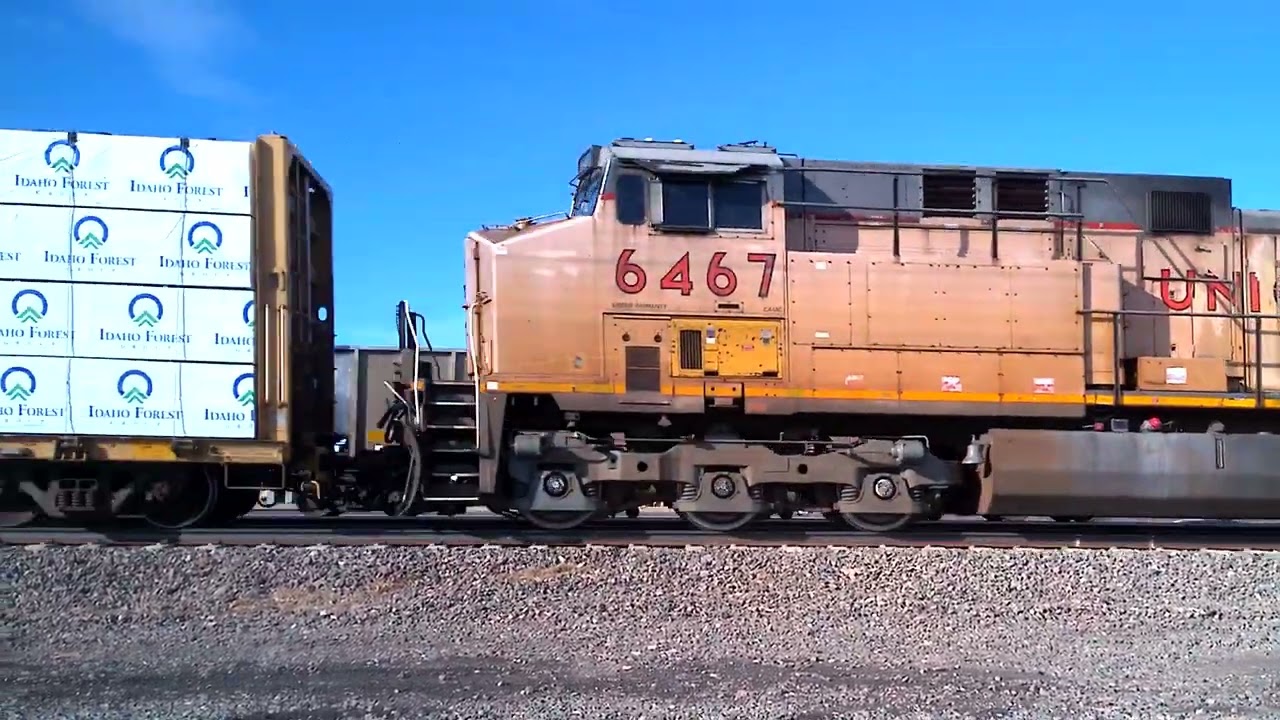 UP 7177 meets UP 6030 west of Gibbon 