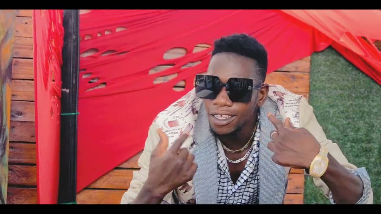 Puto Djona Feat Micheque Njanje_(Kwassala kubzina_Oficial_Musica_Video2024)