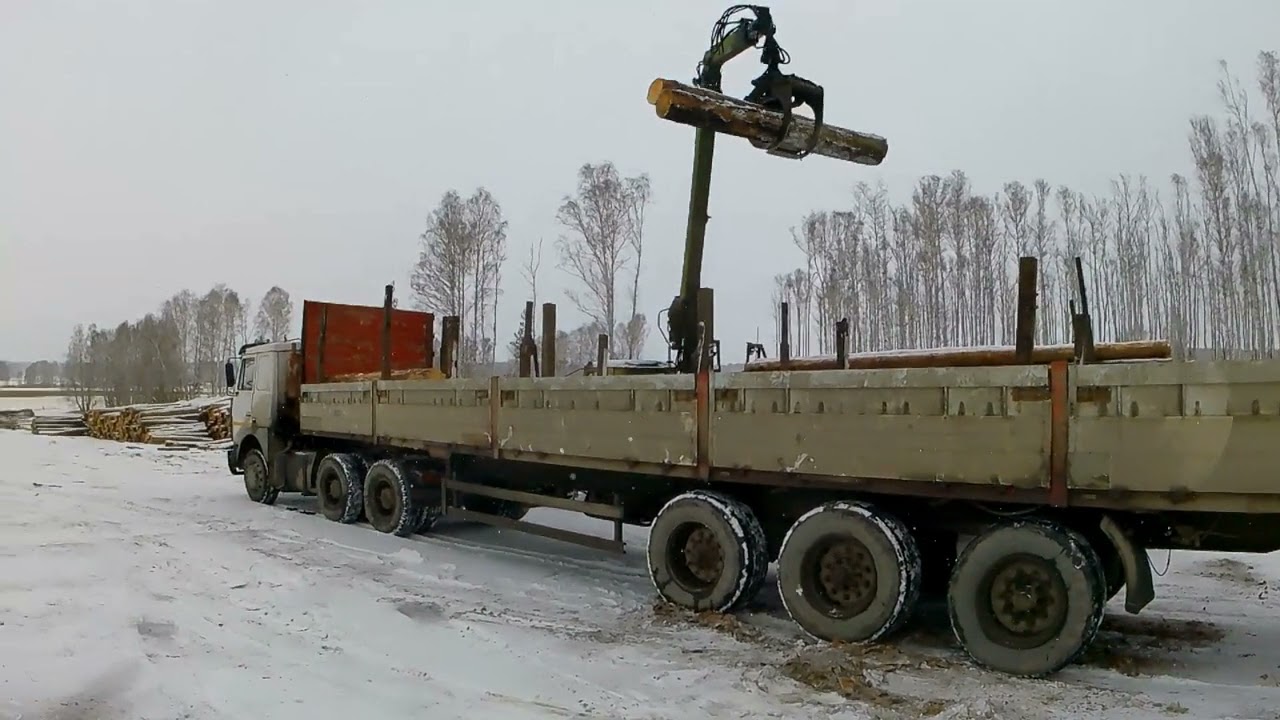 купил МАЗ полуприцеп. таскаю лес. маз лесовоз.