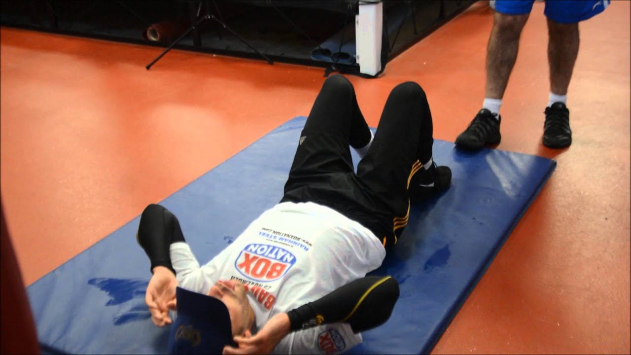 Billy Joe Saunders with trainer Jimmy Tibbs floor exercises for Eubank