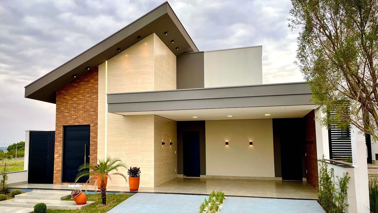 Casa com fachada exclusiva, entregue com móveis planejados e piscina - Condomínio Firenze.