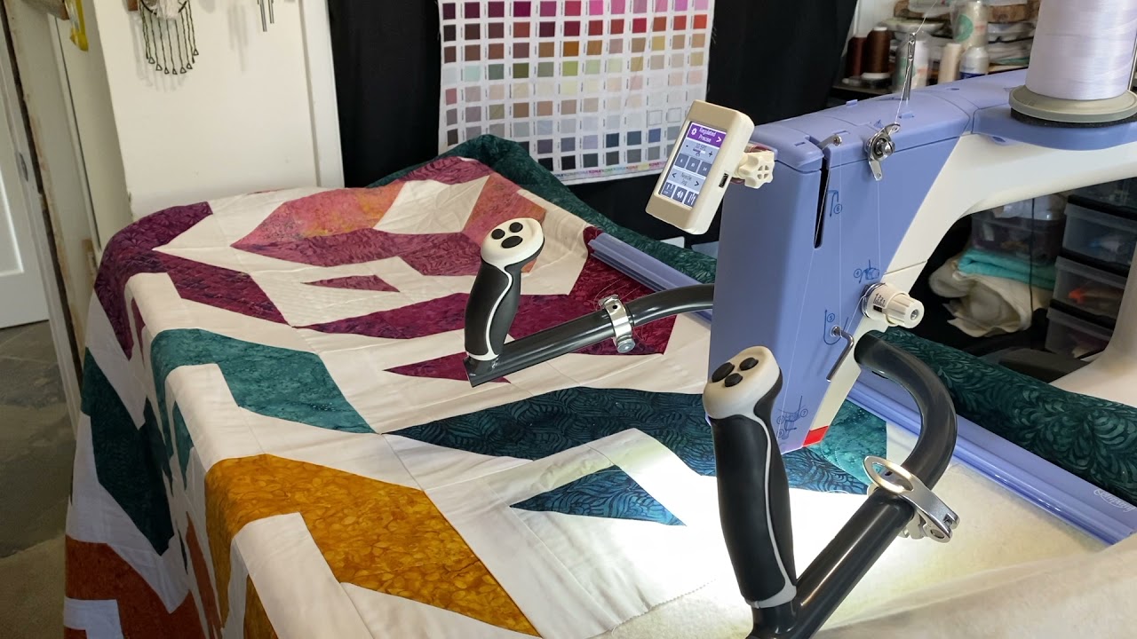 Making Big Quilts in a Small Space   Loading A Quilt on the Cutie Frame
