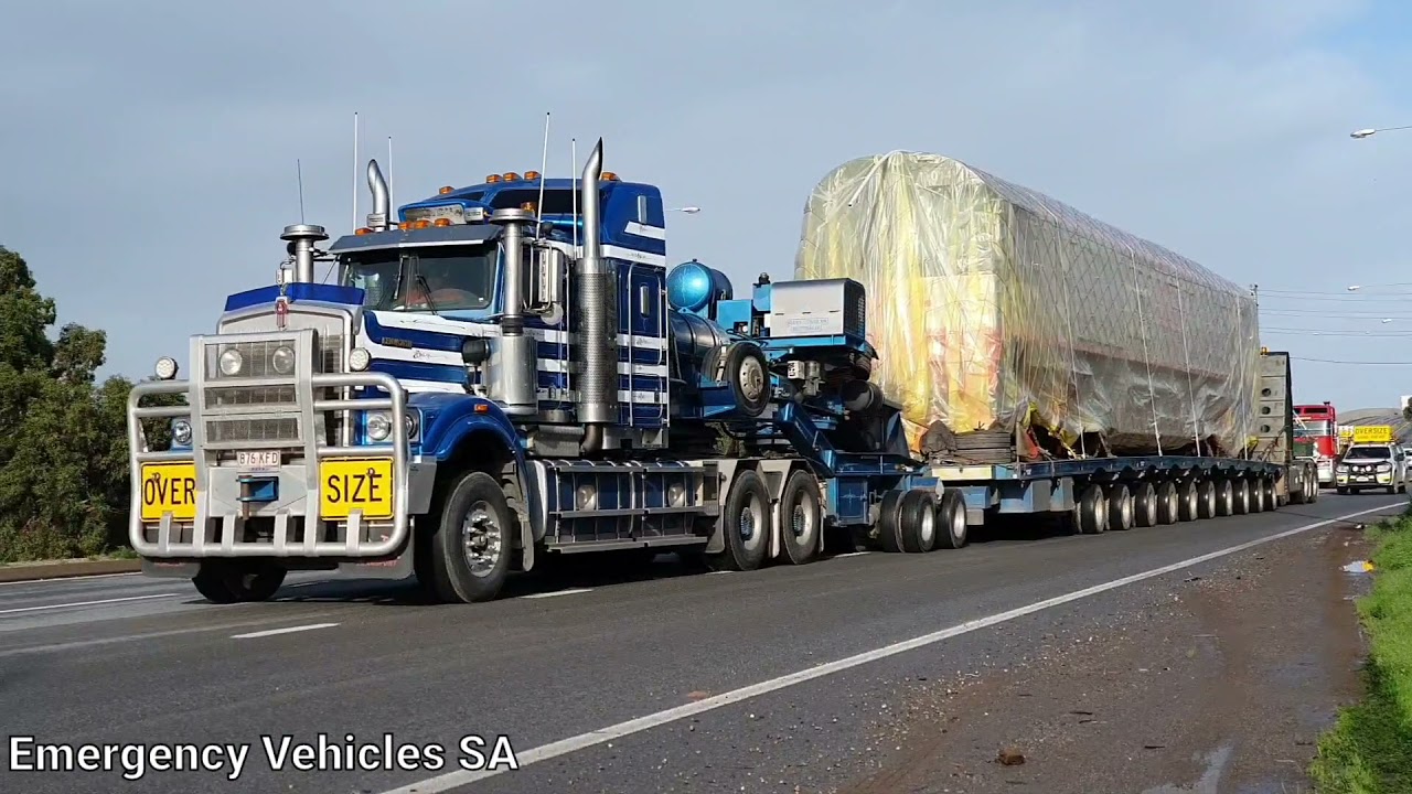 Mitsubishi Outlander Police Escorts with oversize diesel locomotives transport