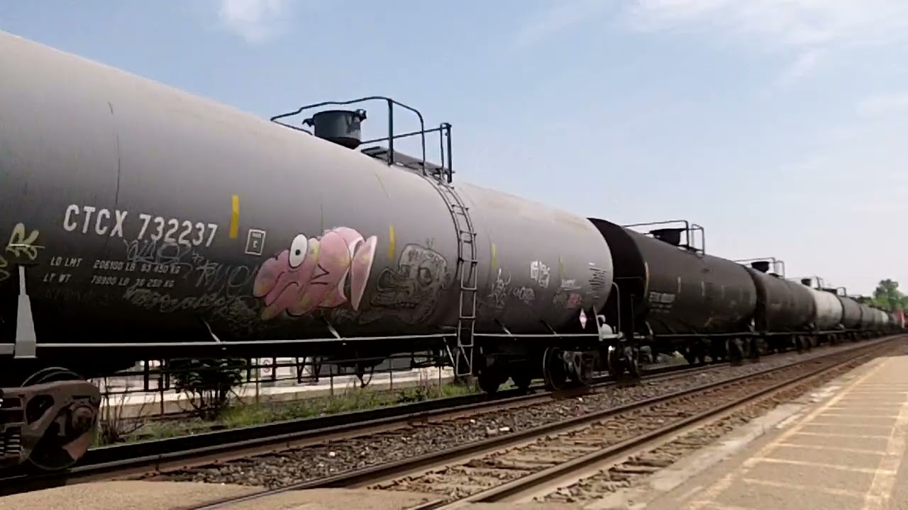 CN 397 w/ CN Engines 8924, 2649 & 5750 lead this long 726 axle, WB Mixed/Baretable train by George