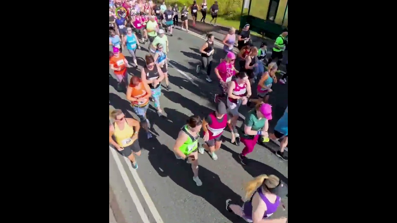 Hundreds of runners cross the start line at the Mic Morris 10km race on Sunday 14 July 2024