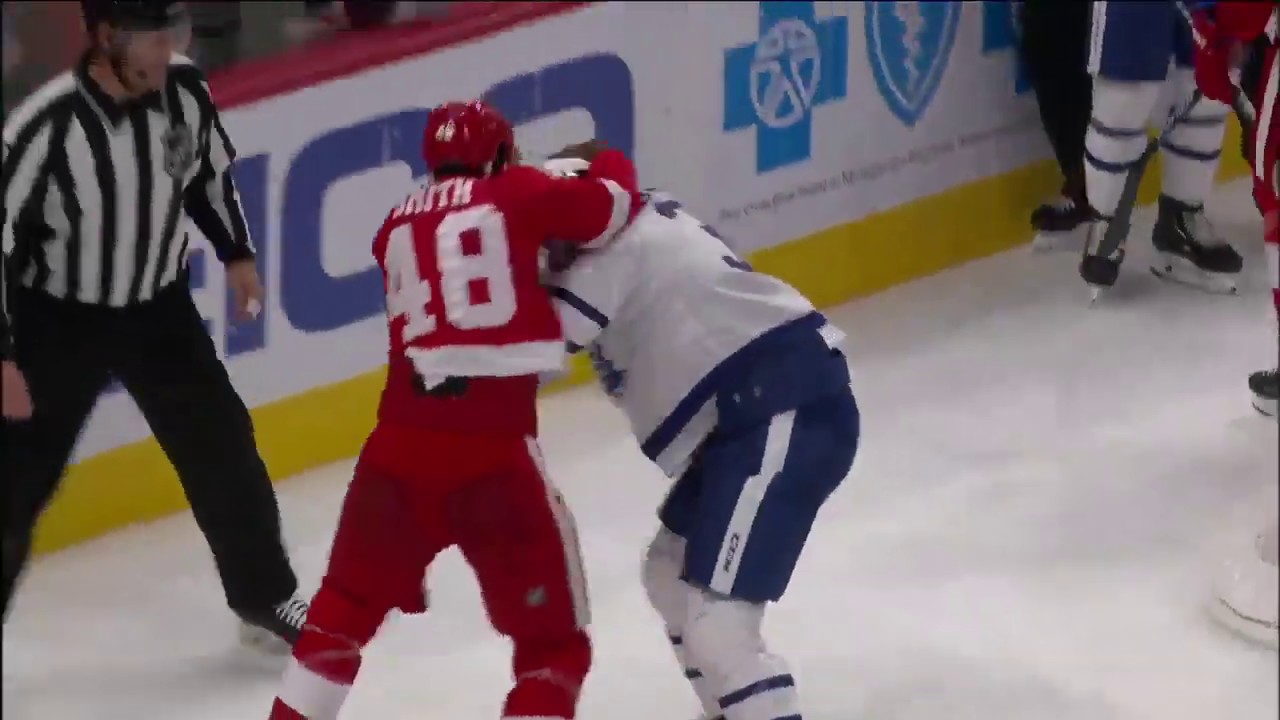 Givani Smith and Tyler Gaudet drop the gloves