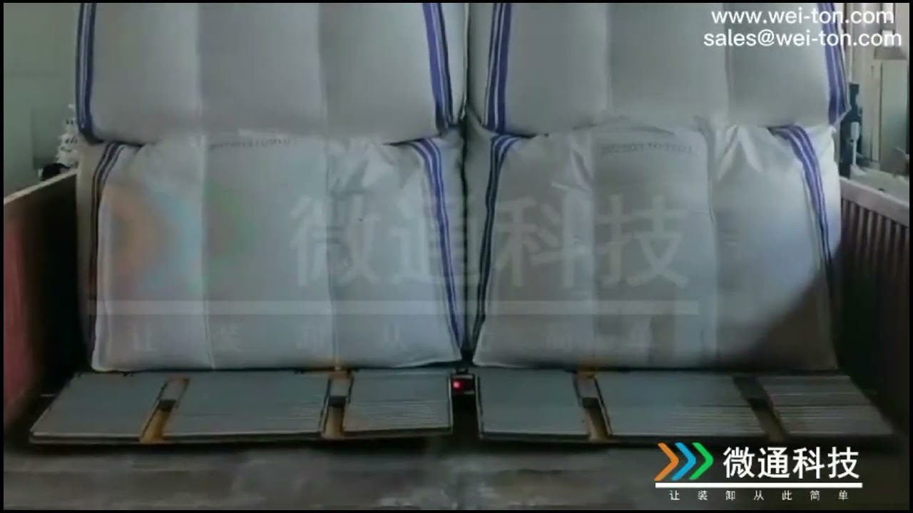 Automatic truck/container loading and unloading system for FIBC