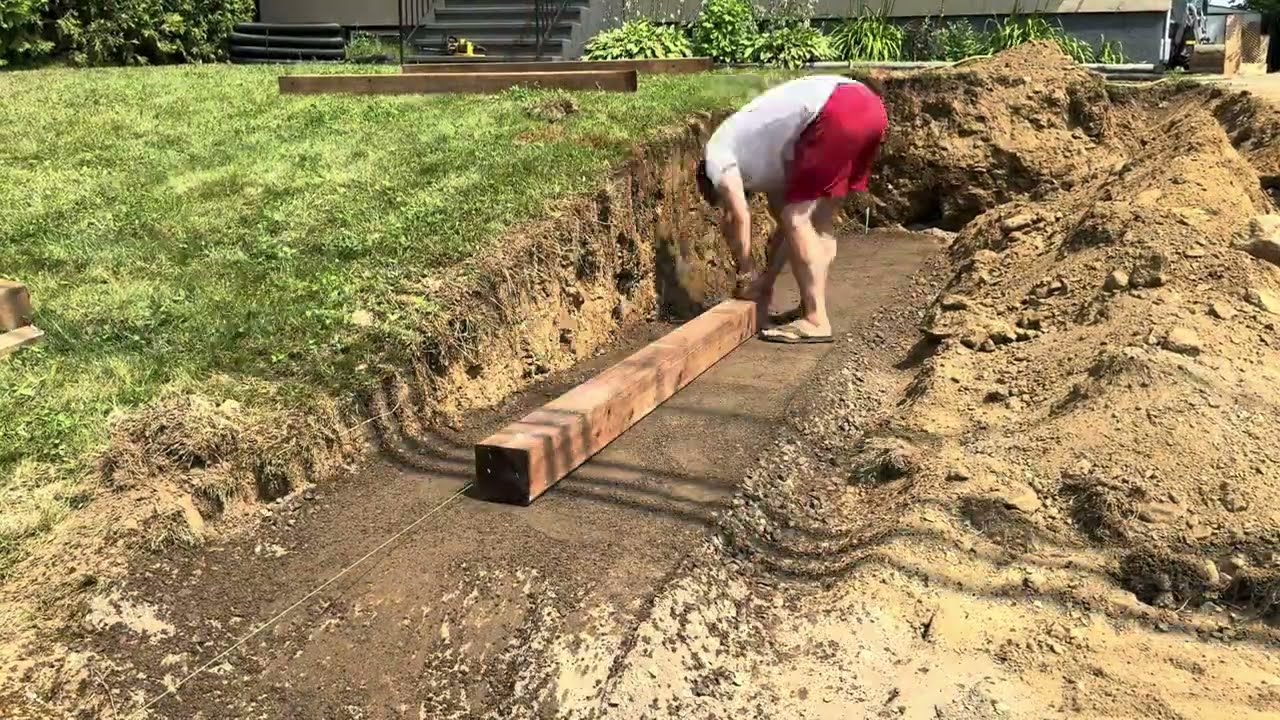 Building a 6x6 treated lumber retaining wall