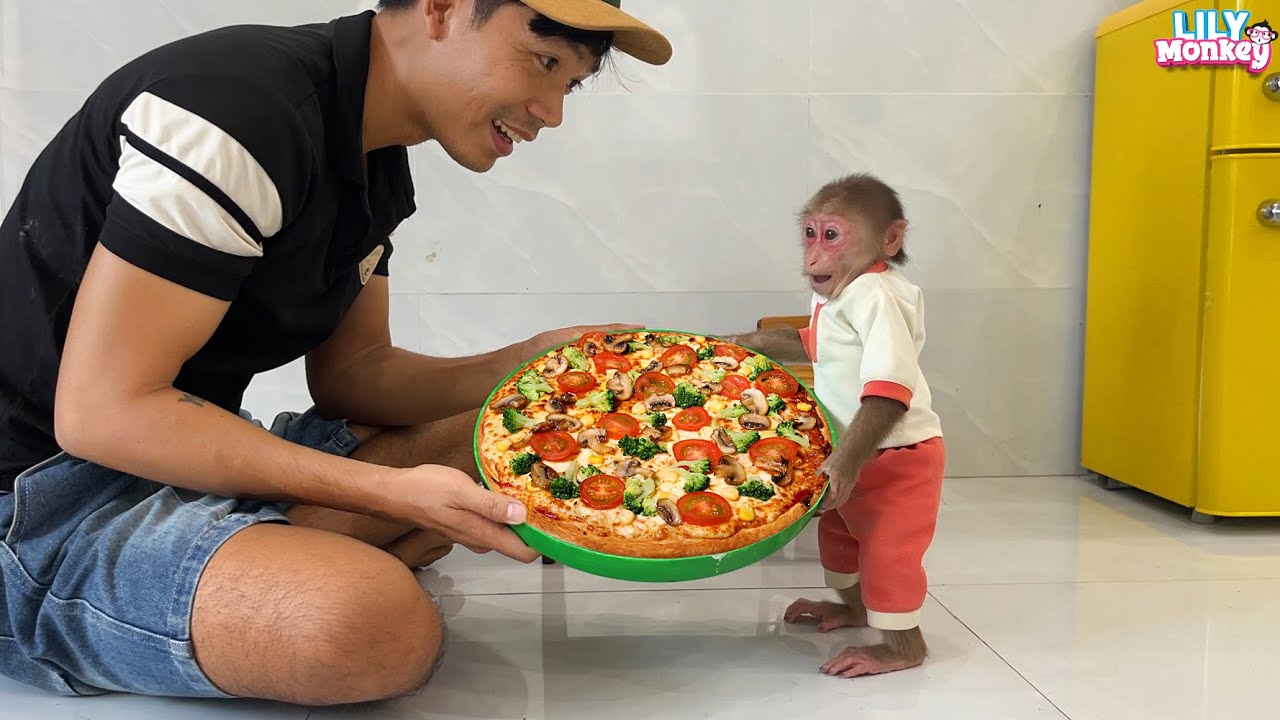 Lily helps dad make special fruit pizza
