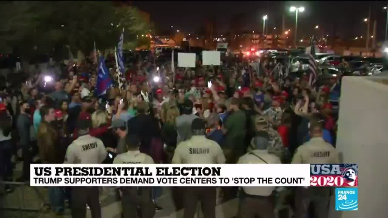 Gun-toting Trump supporters mob vote-counting centres in key states