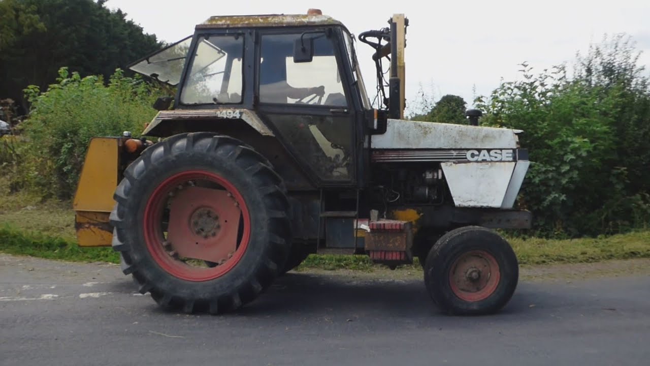 Case tractor Hedge trimming and grass cutting