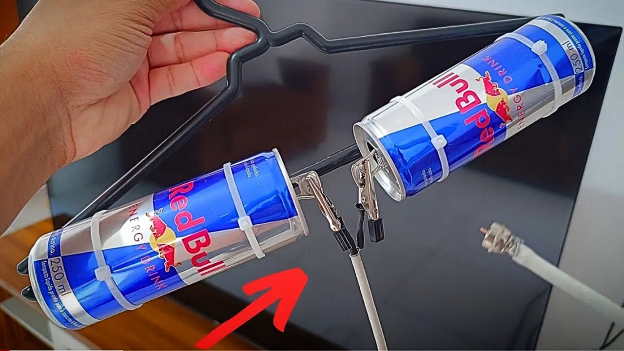 2 canettes en aluminium sur un cintre et regardez toutes les chaines monde TNT TV