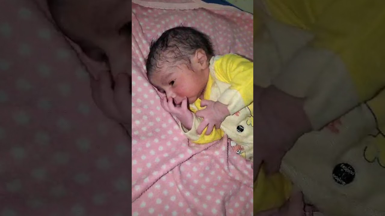 Cute newborn baby calmly move up and down very scene and cute newborn baby