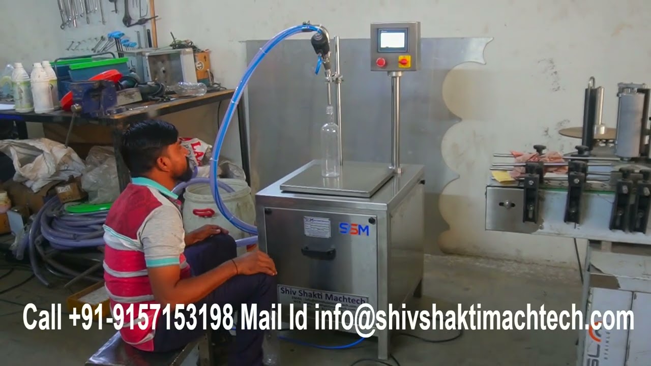 Single Head Load Cell Based Filling Machine for 500ml to 1 liter