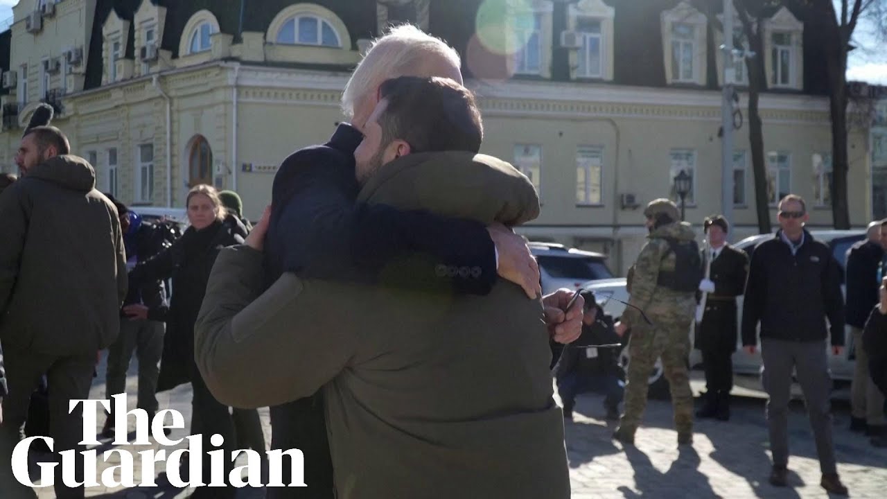 Biden and Zelenskiy hug after visiting Kyiv church to pay tribute to fallen soldiers