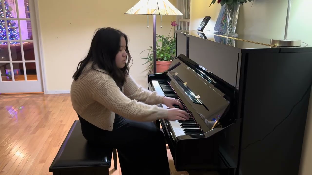Prelude in C Sharp Minor, Op. 3, No. 2 by Sergei Rachmaninoff; played by Michelle Jin