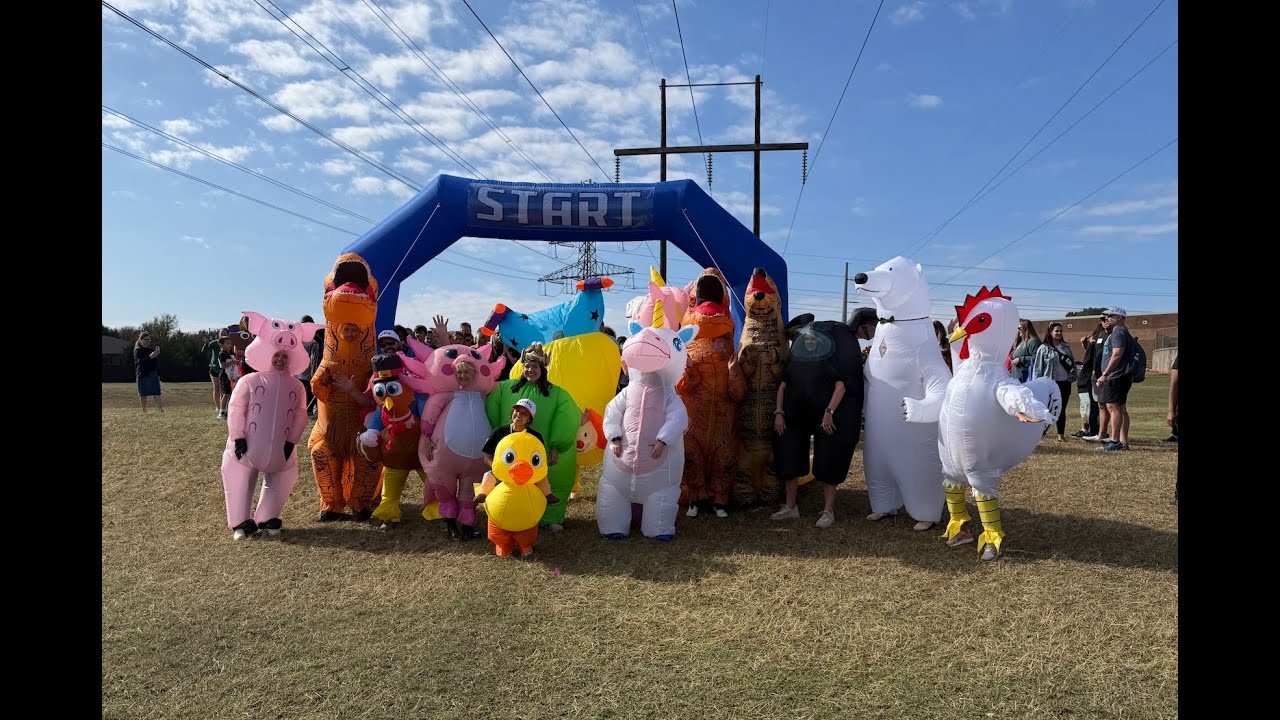 McAuliffe Elementary Race Is On Teacher Inflatable Race/Turkey Trot