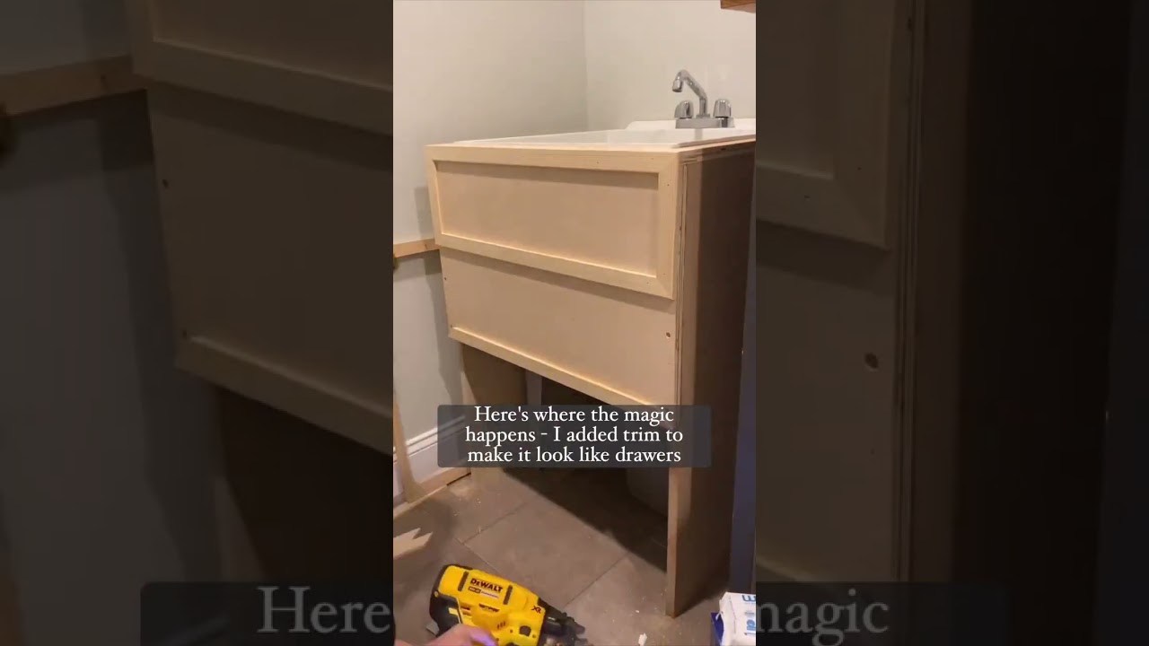 This utility sink went from 0 to 💯 with this DIY faux vanity! Now it fits in with the rest of the