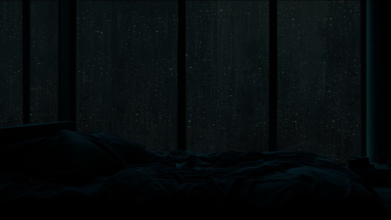 Rain Falling Outside A Dark Silent Room Sets A Mood For Reflection And Midnight Calm