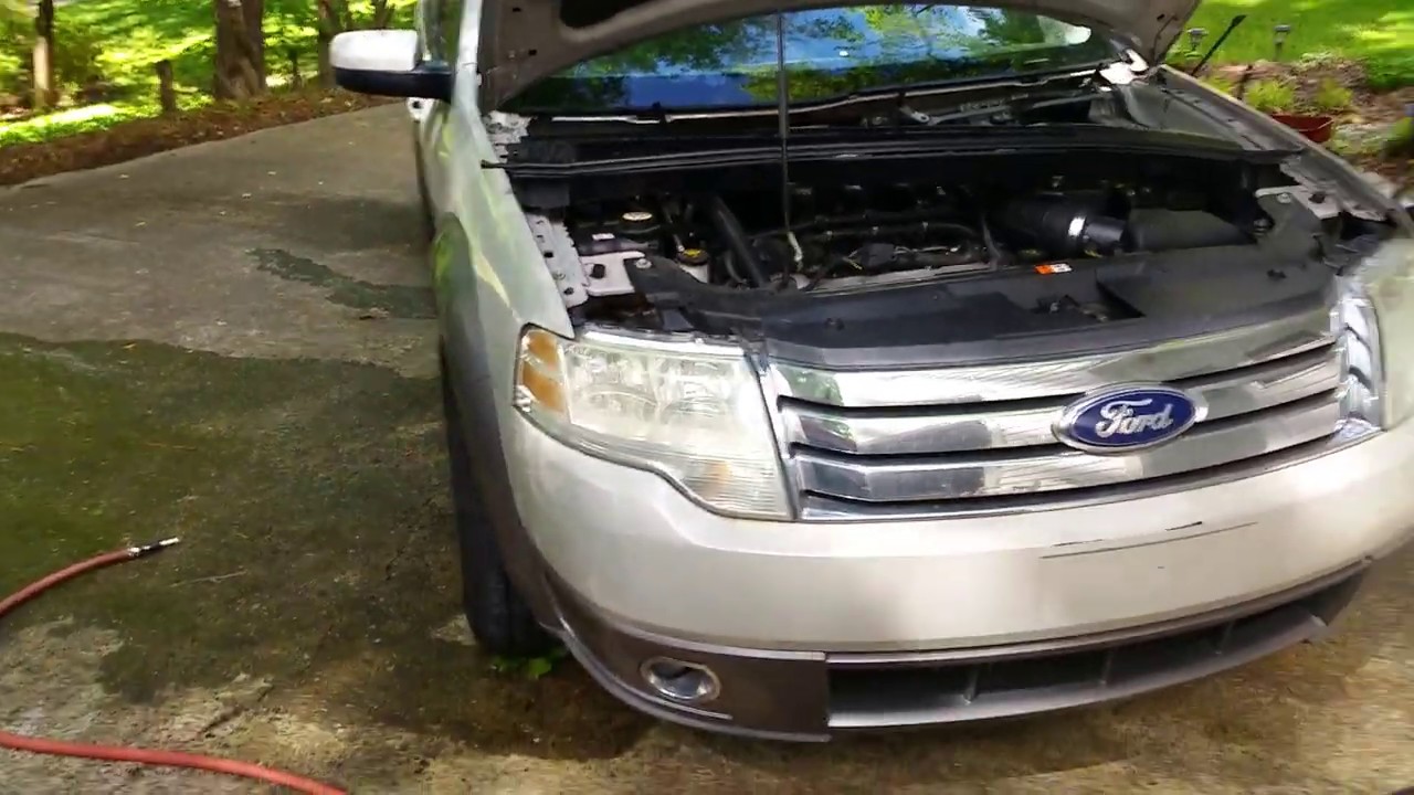 Water in floorboard of car - drain is clogged of Ford Taurus any