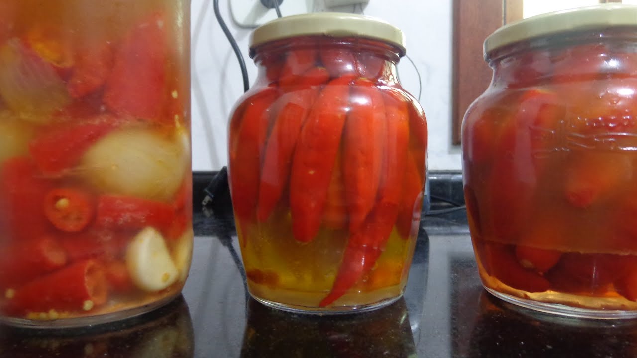 Como Fazer conserva de pimenta no azeite ou óleo.