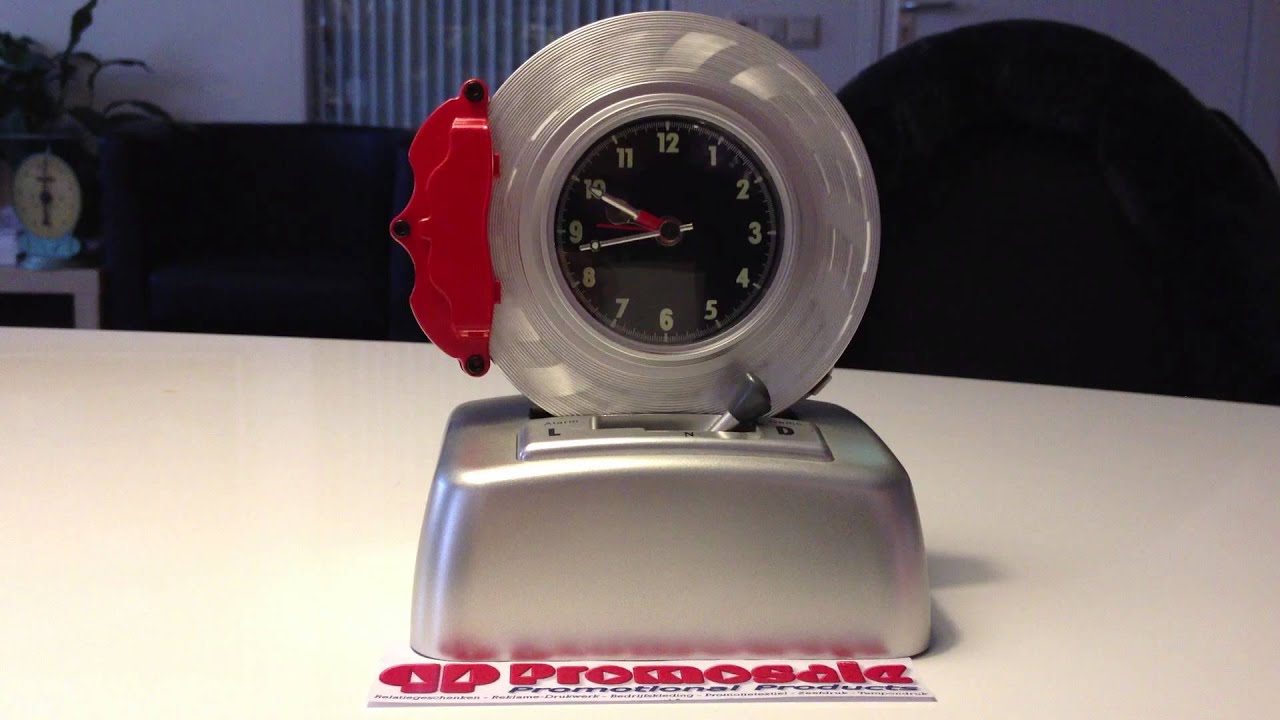 Draaiende remschijfvormige klok met racegeluid. - Promosale - Relatiegeschenken