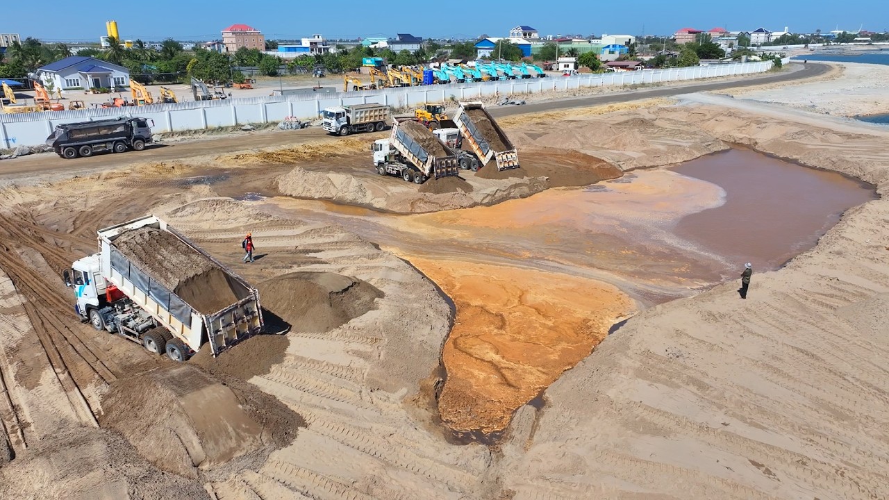 Good Job!!Wheel Loader SDLG Push Sand Into Water And DumpTruck Unloading Sand Filling Lake