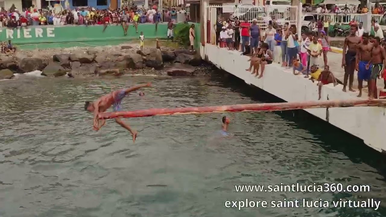 GREASY POLE, CANOE RACING, SWIMMING RACE FOR SAINT LUCIA NATIONAL DAY IN SOUFRIERE
