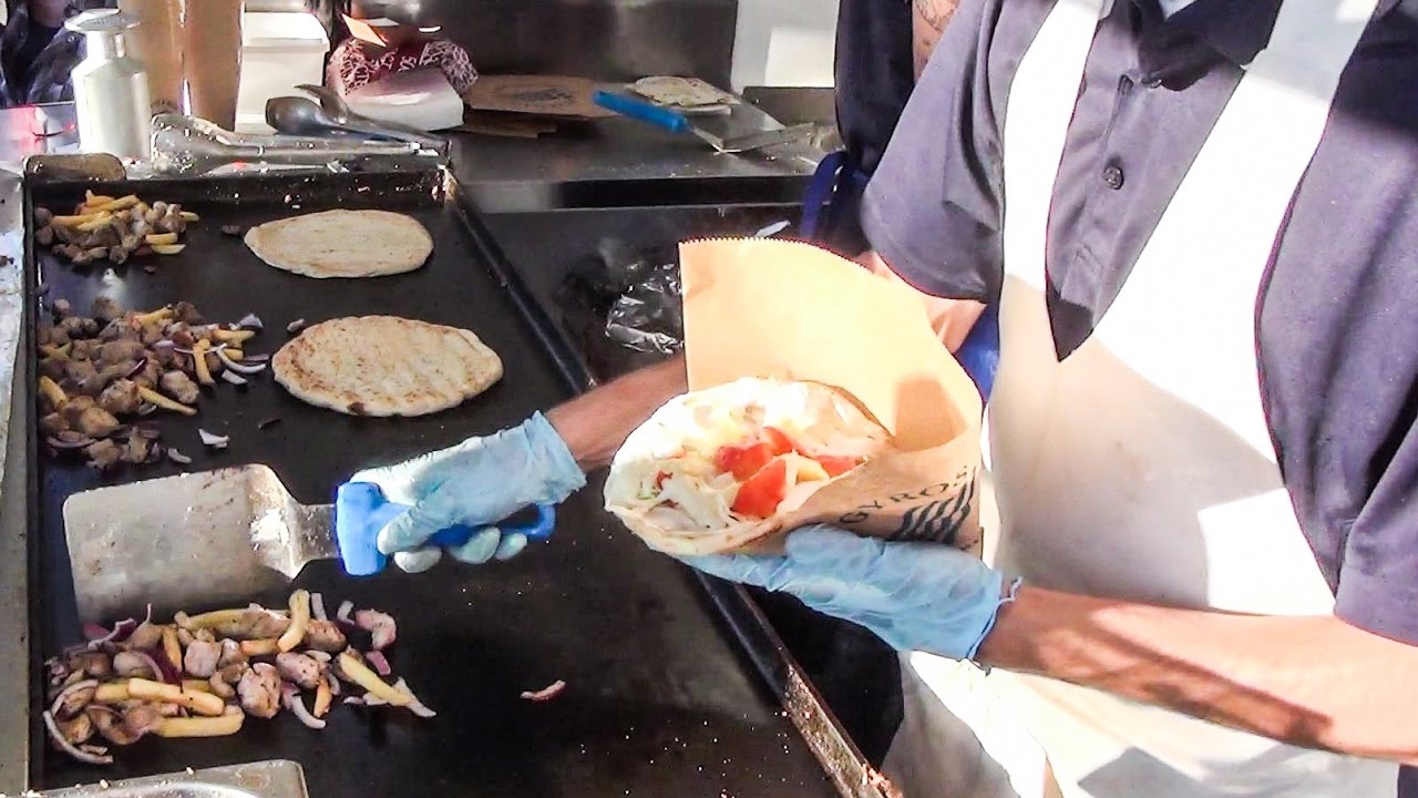 Greek Pita Gyros with Pork, Lamb and Chicken. Italian Street Food Tasted in Milano